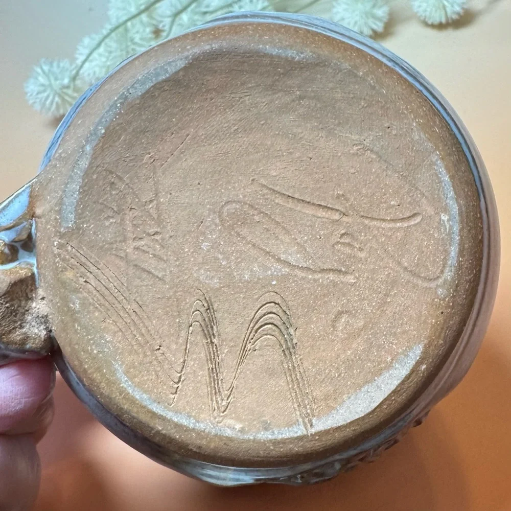 Artist Signed Wheel Spun Pottery mug. Handmade custom piece
